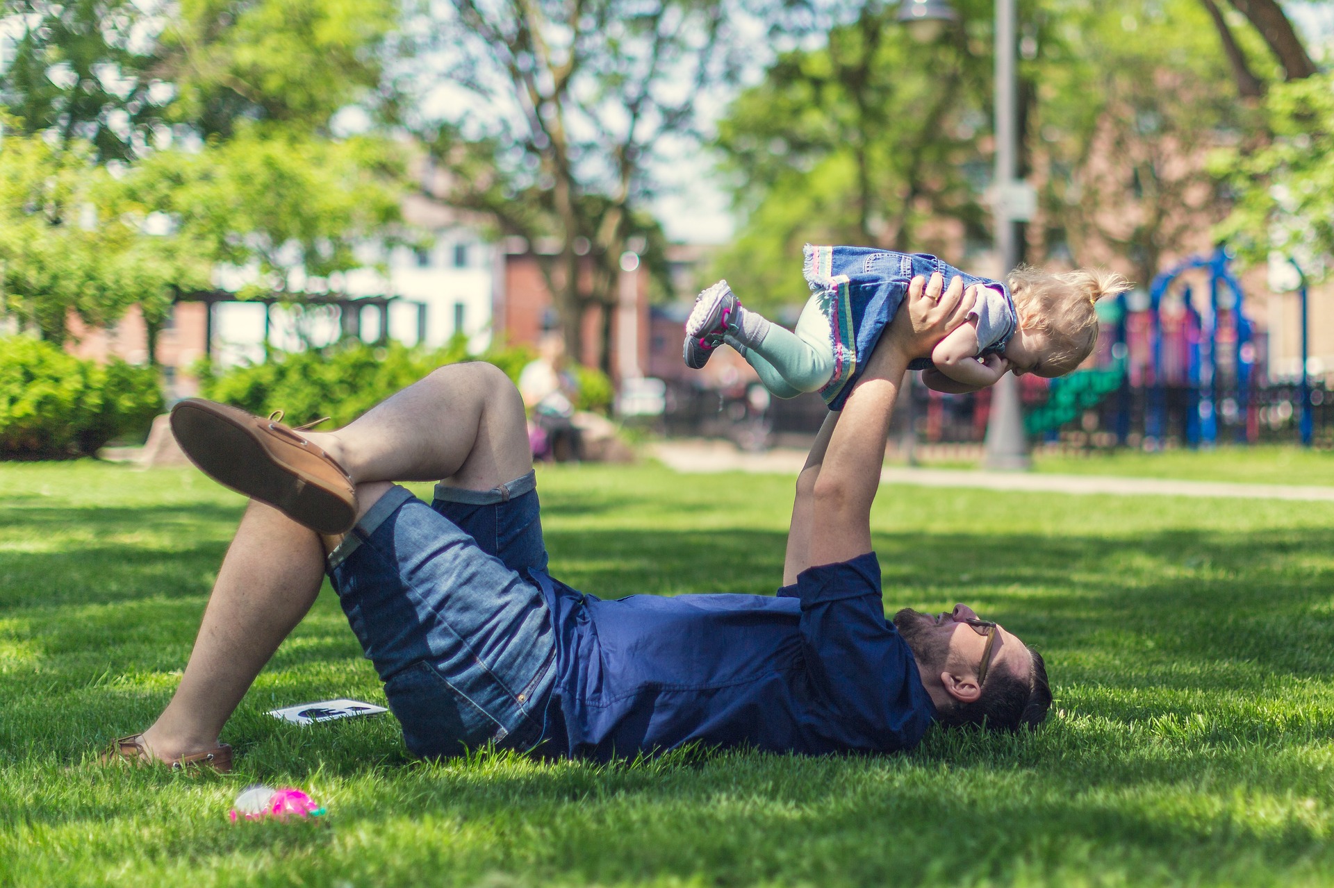 dad-and-daughter-playing-on-the-park